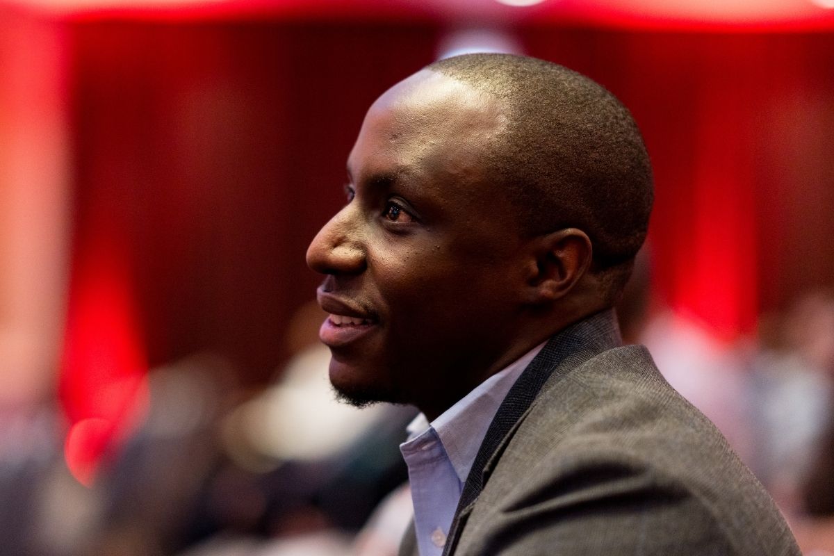 Leon Soko, Head of Presales at Revival, smiles as he listens to a talk on GRC in Africa.